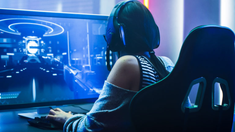 Shot,Of,The,Beautiful,Pro,Gamer,Girl,Playing,In,First-person